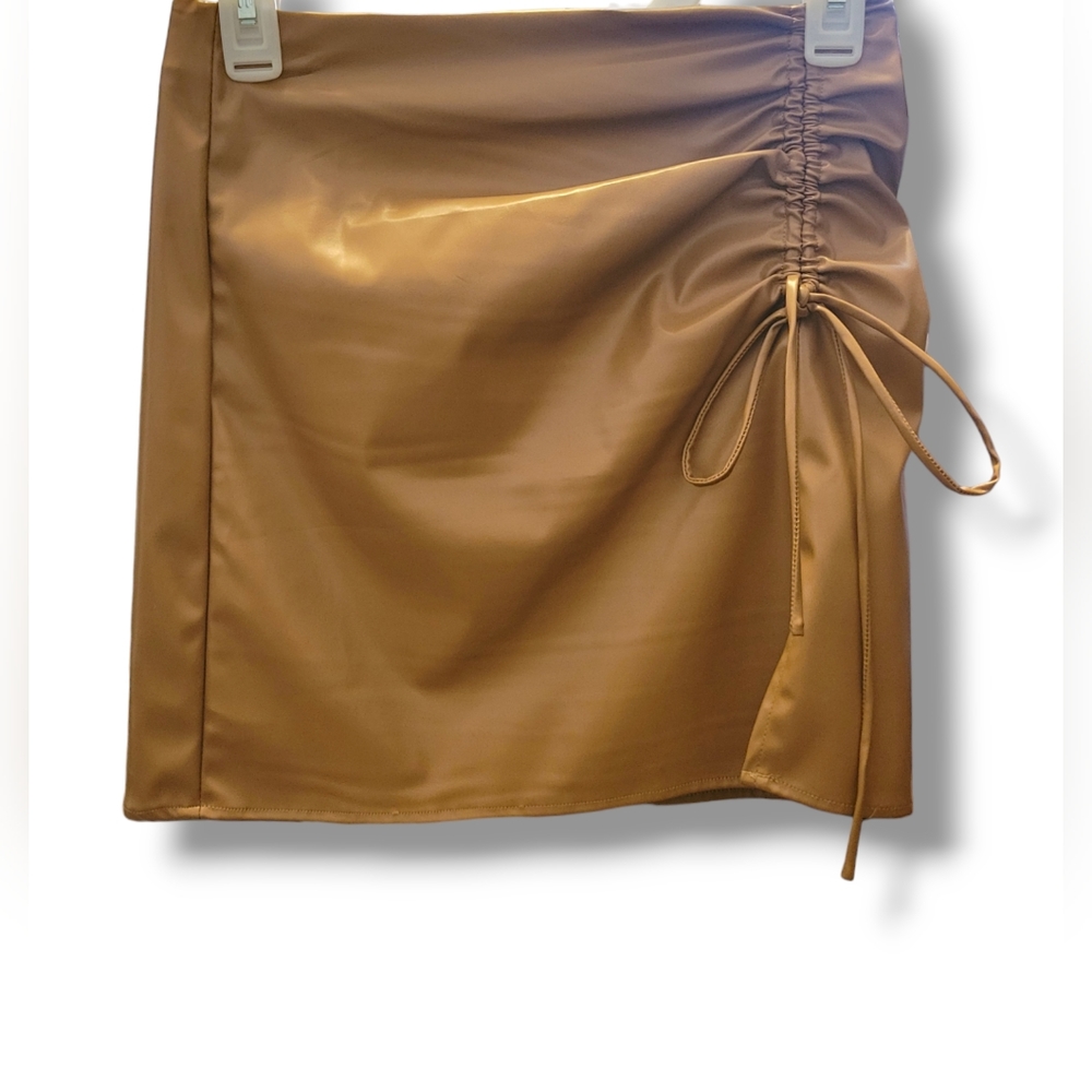 NWT Brown Faux Leather Mini skirt. CIDER. Side slit with rouching.